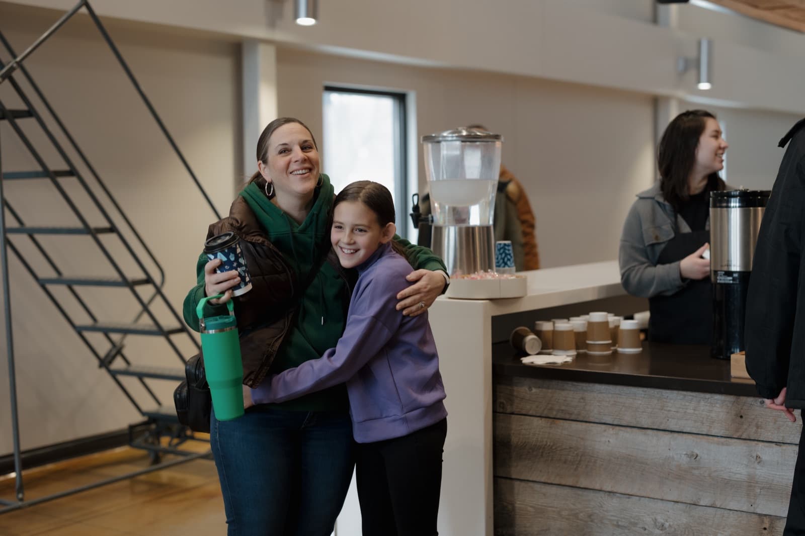Mother and daughter sharing a moment at church.